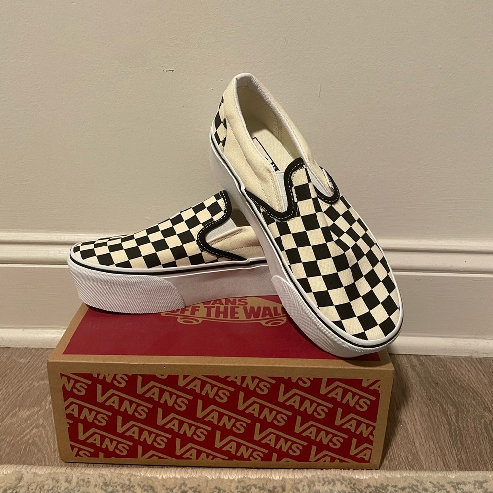 Platform Vans Black and White Checkerboard Slip-On Sneakers